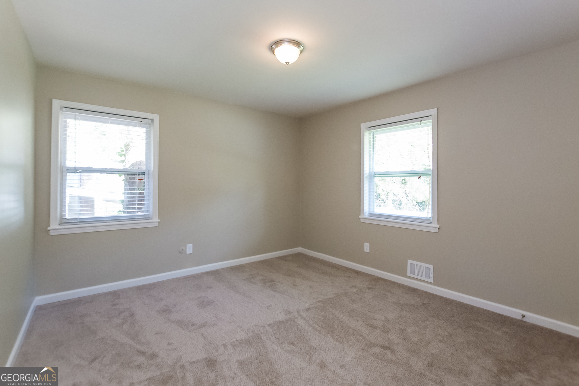 2309 Omaha Road Southwest Atlanta, GA 30331 - Photo 6 of 15 an empty room with a window