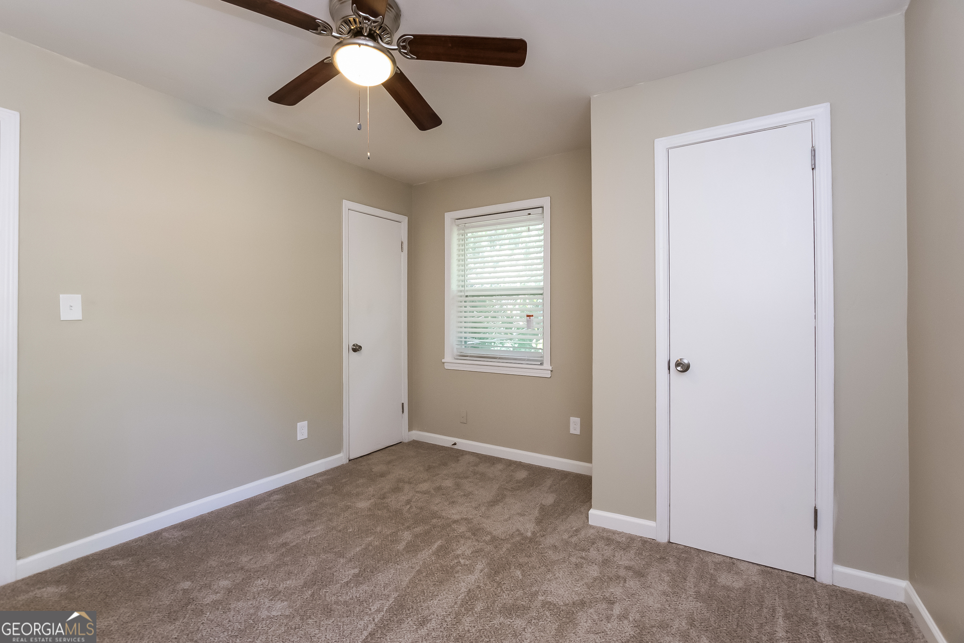 2309 Omaha Road Southwest Atlanta, GA 30331 - Photo 8 of 15 a view of empty room with window