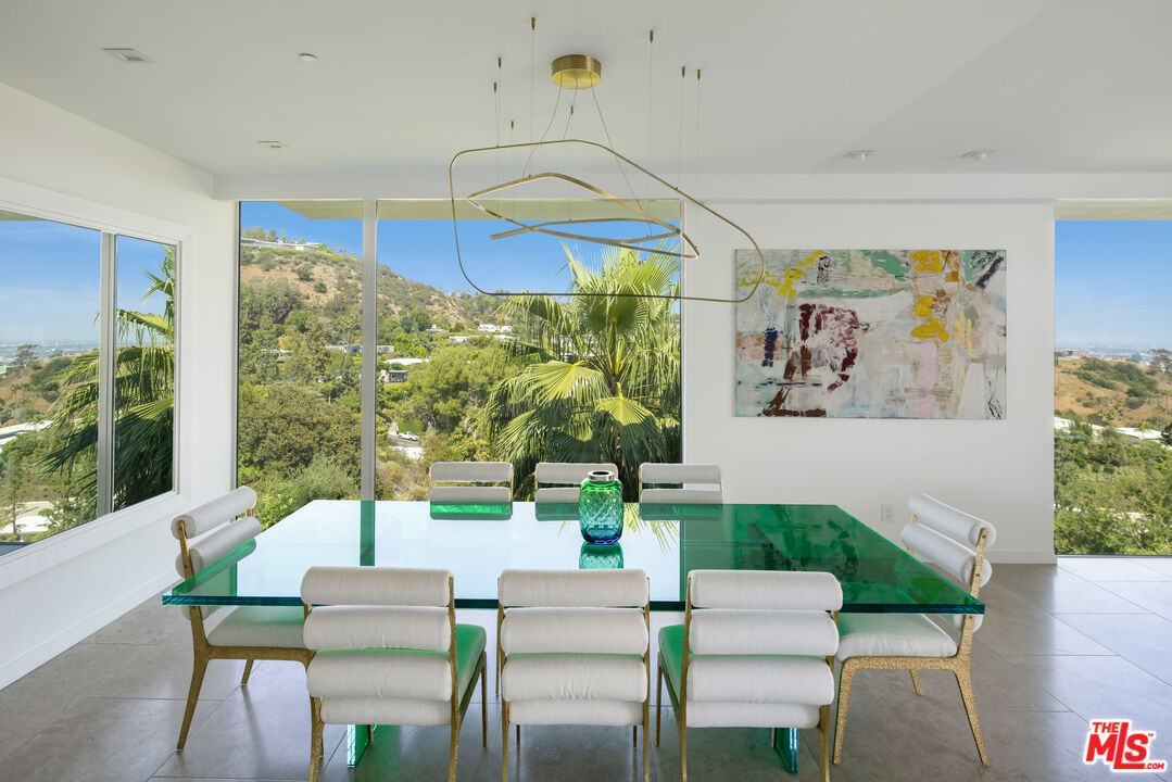 1476 Carla Ridge Beverly Hills, CA 90210 - Photo 15 of 27 a living room with patio furniture