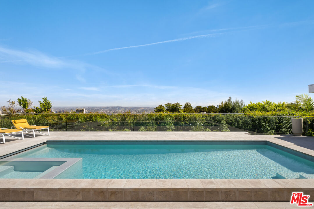 1476 Carla Ridge Beverly Hills, CA 90210 - Photo 21 of 27 a view of a yard with an outdoor space