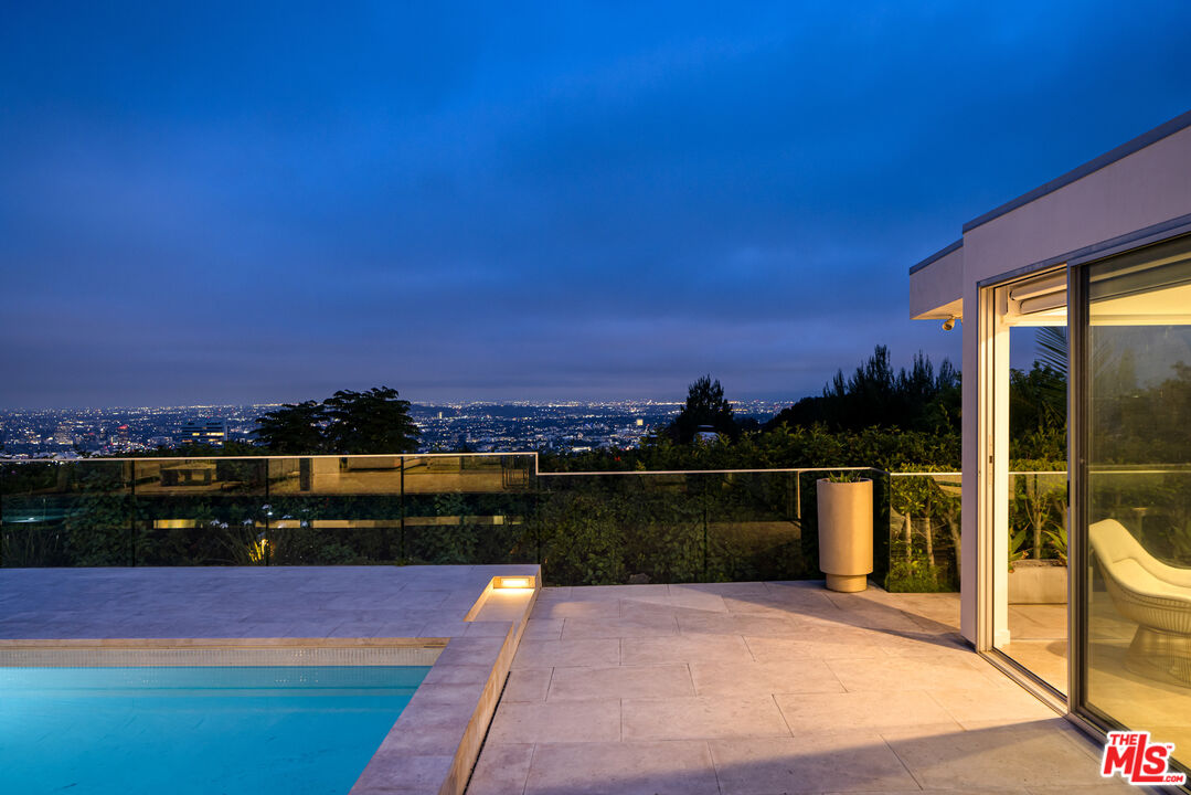 1476 Carla Ridge Beverly Hills, CA 90210 - Photo 26 of 27 a view of a lake with a outdoor space