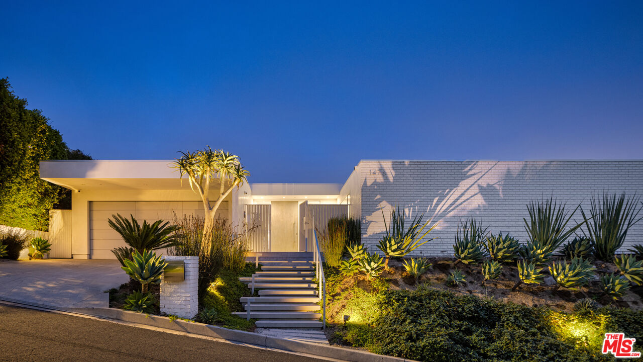 1476 Carla Ridge Beverly Hills, CA 90210 - Photo 8 of 27 a view of a potted plants next to a building