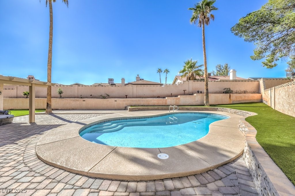 2240 Grayson Circle Henderson, NV 89014 - Photo 32 of 38 View of swimming pool with a fenced backyard and a patio area