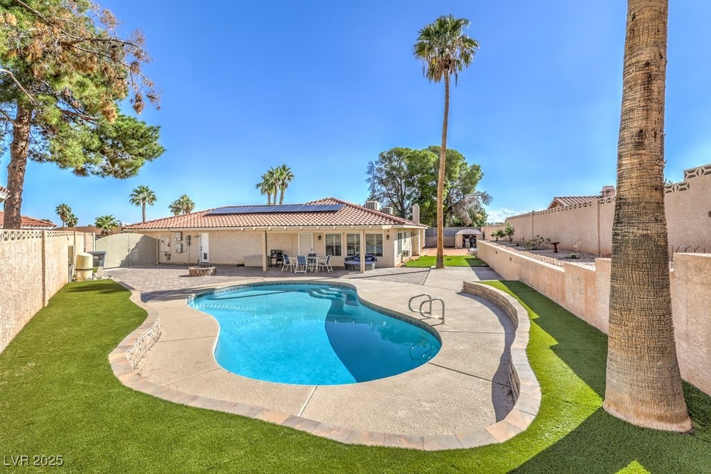 2240 Grayson Circle Henderson, NV 89014 - Photo 33 of 38 View of swimming pool featuring a patio area and a fenced backyard
