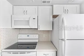a bathroom with a bathtub sink and toilet