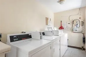 a view of a deck with hardwood and lake view