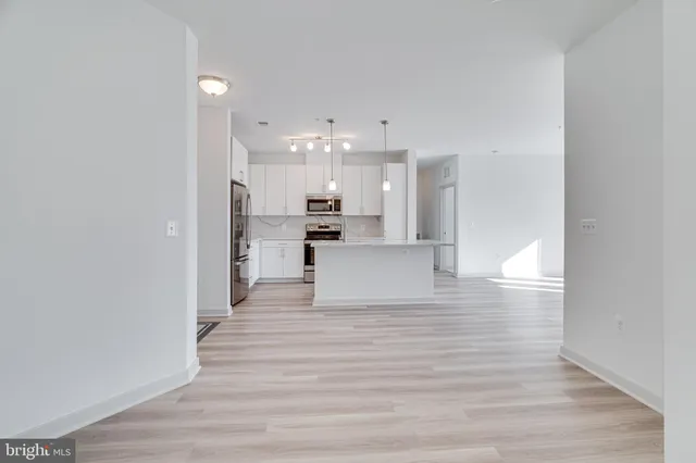 a view of kitchen with wooden floor