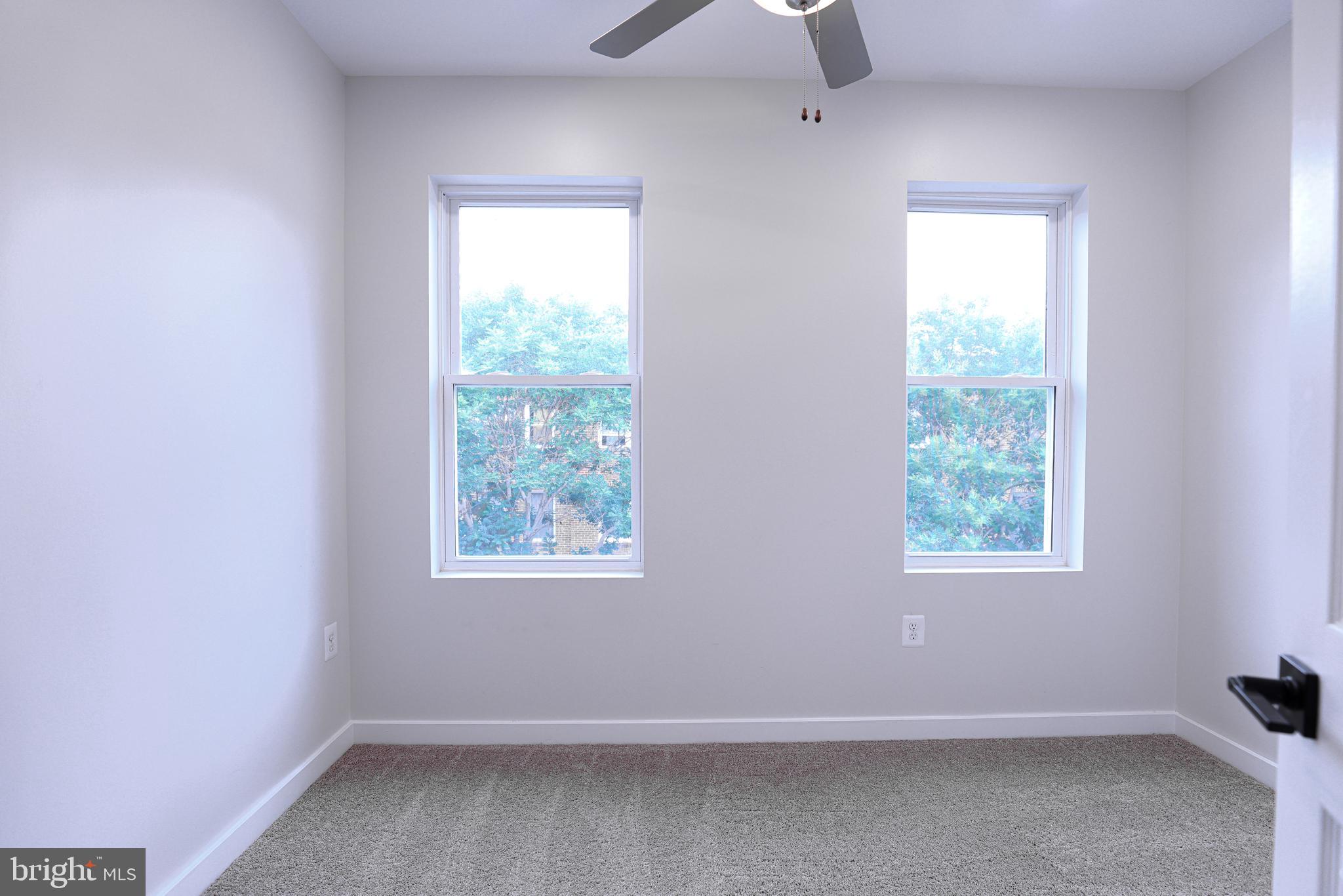2039 Rosedale Street Northeast Washington, DC 20002 - Photo 10 of 18 an empty room with a window