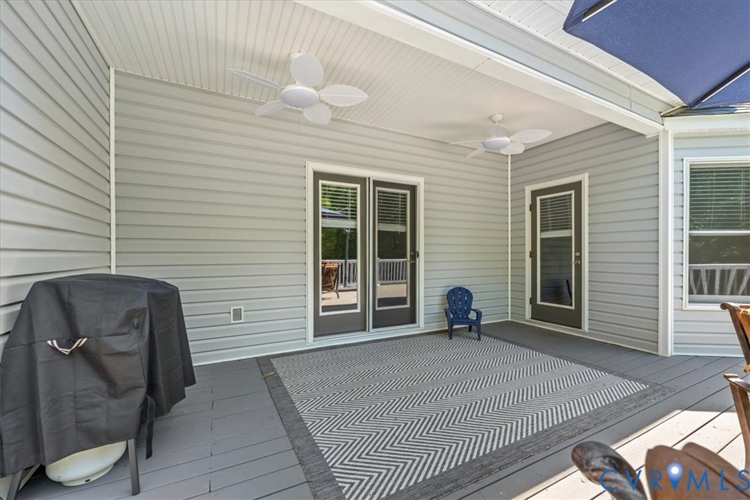 3060 Moyer Road Powhatan, VA 23139 - Photo 62 of 66 Covered patio featuring two ceiling fans and durab
