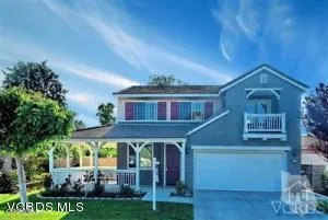 a front view of a house with a porch