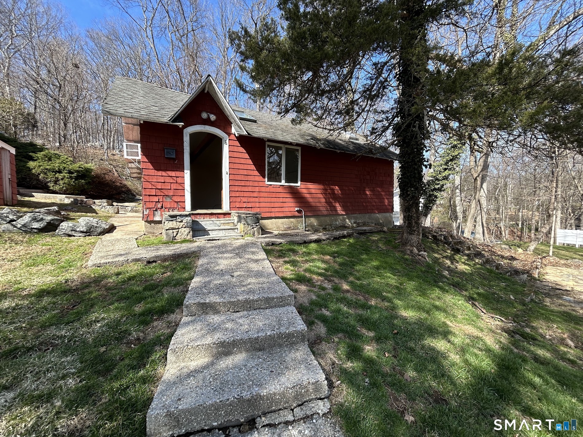 236 Wire Mill Road Stamford, CT 06903 - Photo 1 of 11 a front view of house with yard