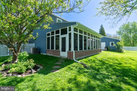 a view of a backyard with a garden