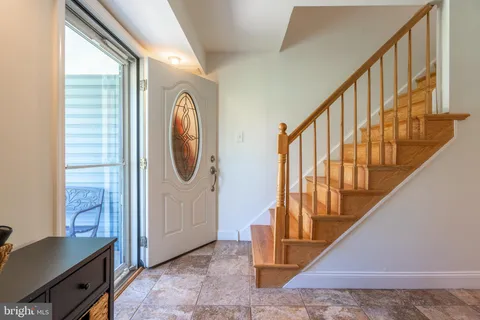 a view of an entryway with staircase