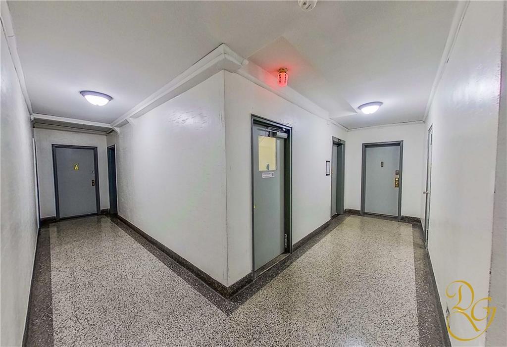 9801 Shore Road, Unit 2O Brooklyn, NY 11209 - Photo 13 of 24 a view of hallway with wooden floor