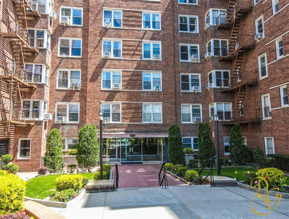 9801 Shore Road, Unit 2O Brooklyn, NY 11209 - Photo 19 of 24 a view of a building with a yard