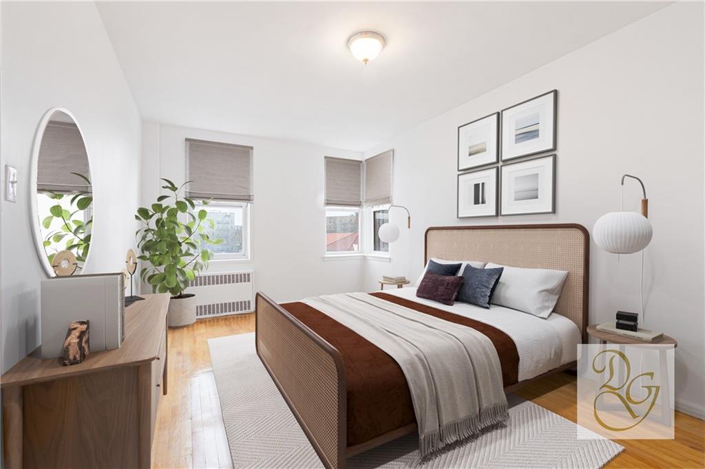 9801 Shore Road, Unit 2O Brooklyn, NY 11209 - Photo 7 of 24 a bedroom with bed and window