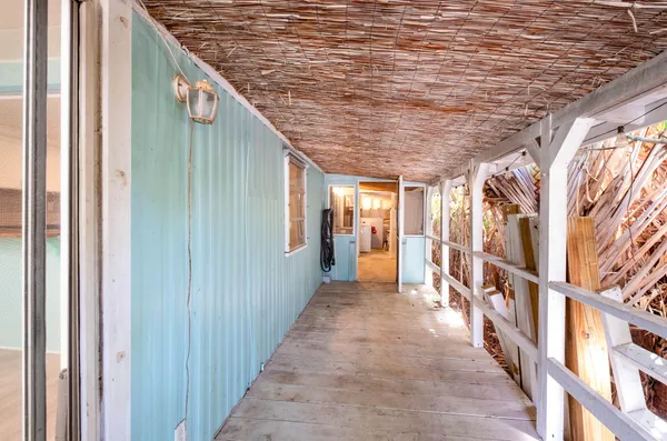 a view of a barn house in the middle of a yard