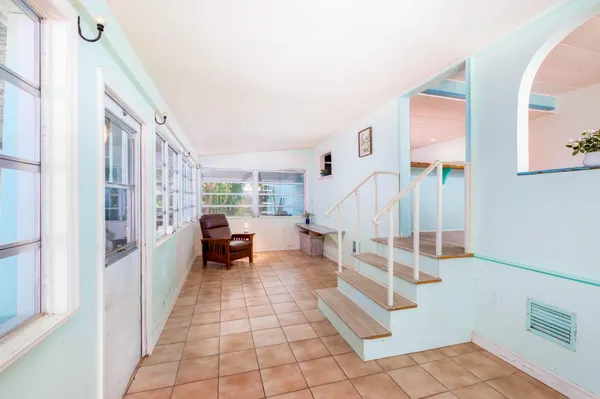 a view of entryway with a front door