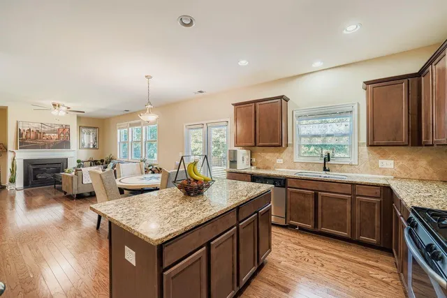 a kitchen with sink and cabinets