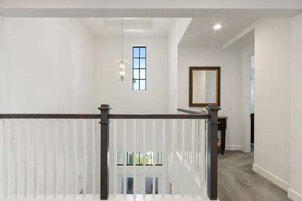 a kitchen with stainless steel appliances granite countertop a refrigerator sink and stove