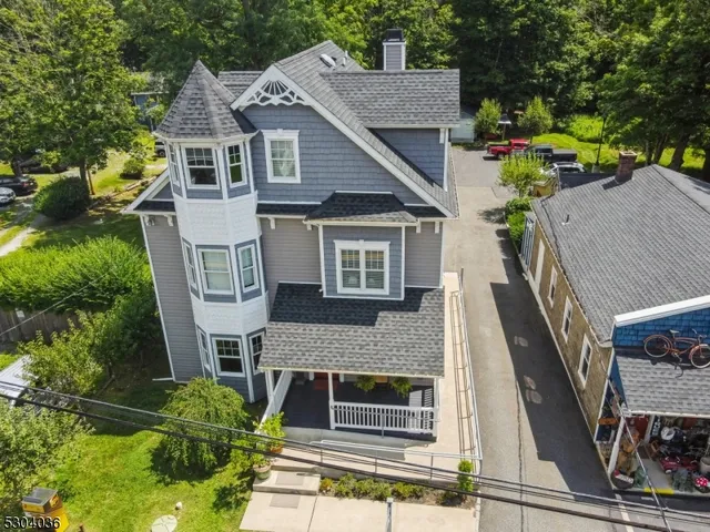 a aerial view of a house with a porch