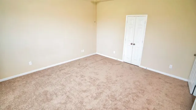an empty room with an entryway