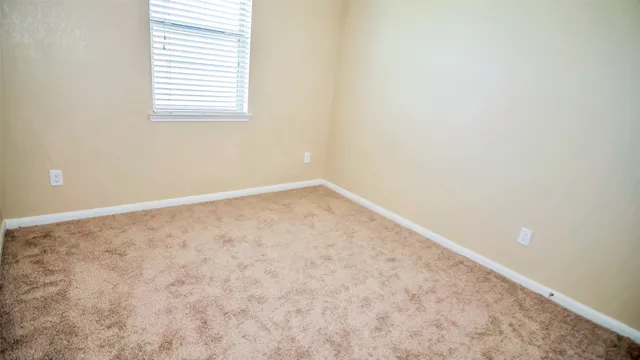 a view of a kitchen with a sink