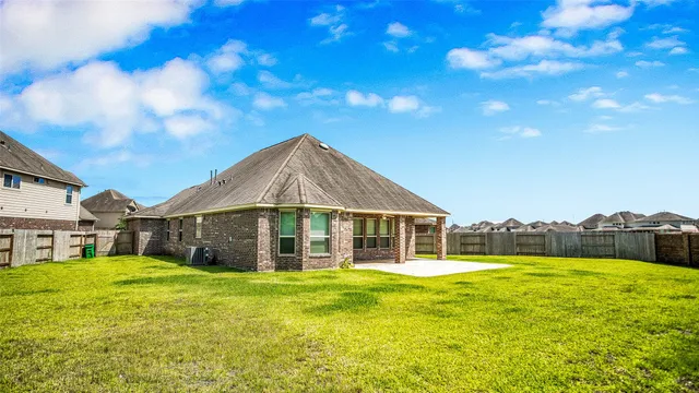 a view of back yard of the house