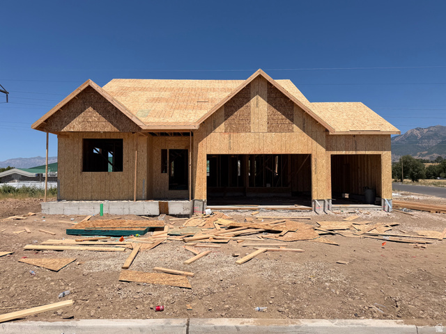 1004 West Paramount Cove South, Unit 315 Ogden, UT 84405 - Photo 2 of 42 New construction framing with a two-car garage