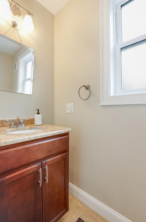 10 Maple Way Wakefield, MA 01880 - Photo 12 of 26 a view of bathroom with granite countertop