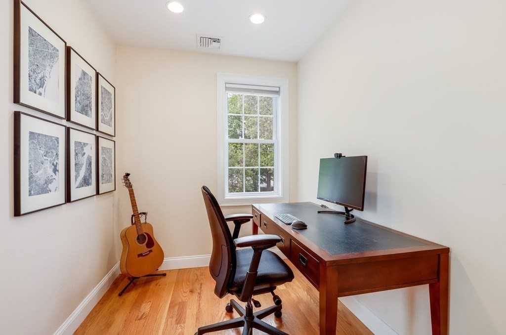 10 Maple Way Wakefield, MA 01880 - Photo 18 of 26 a view of a workspace with furniture and a window