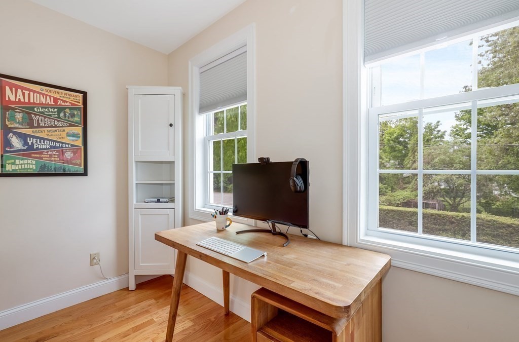 10 Maple Way Wakefield, MA 01880 - Photo 20 of 26 a view of a workspace with furniture and a window