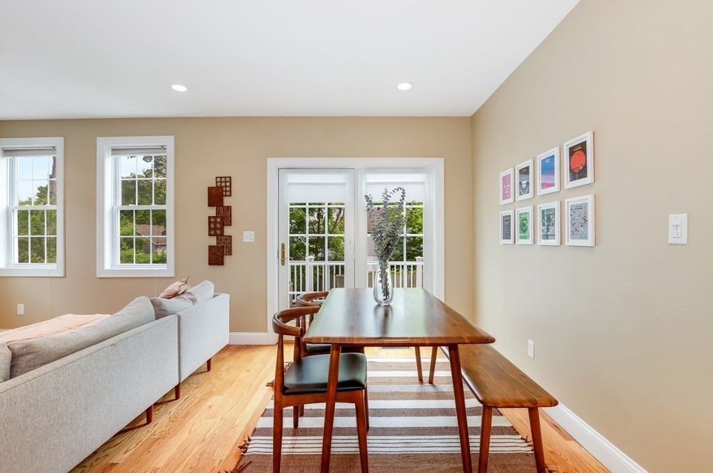 10 Maple Way Wakefield, MA 01880 - Photo 7 of 26 a dining room with wooden floor and large window