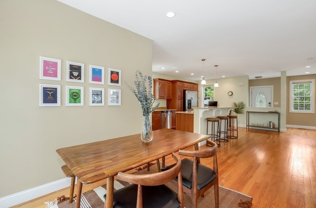 10 Maple Way Wakefield, MA 01880 - Photo 8 of 26 a view of a dining room with furniture and wooden floor