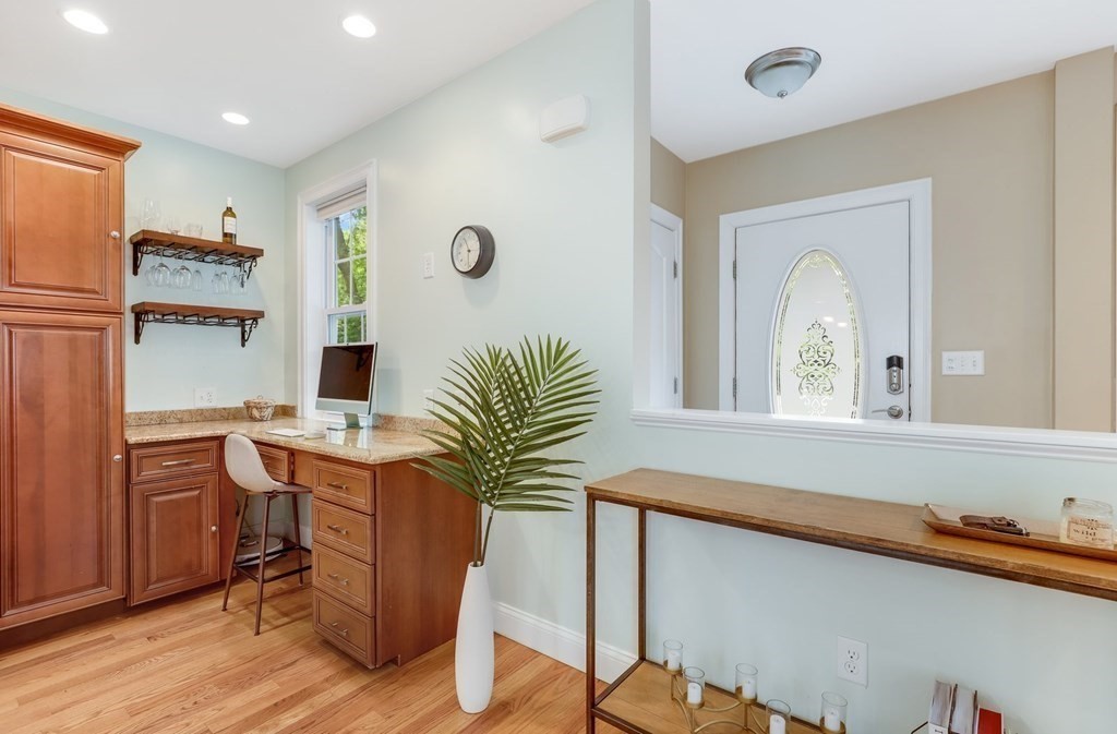 10 Maple Way Wakefield, MA 01880 - Photo 10 of 26 a living room with furniture and wooden floor
