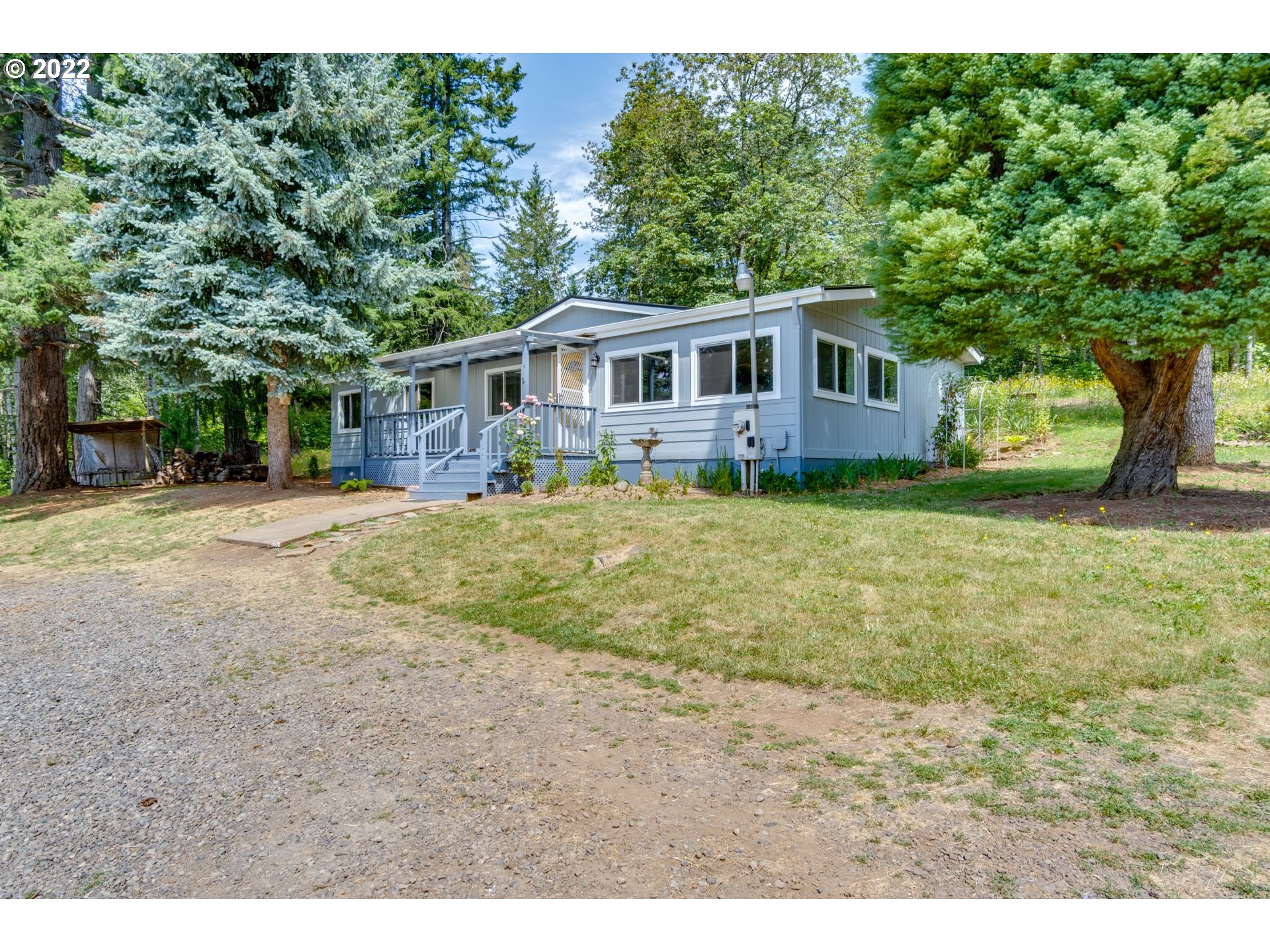 35355 Southeast Surface Road Estacada, OR 97023 - Photo 1 of 32 a front view of a house with a yard