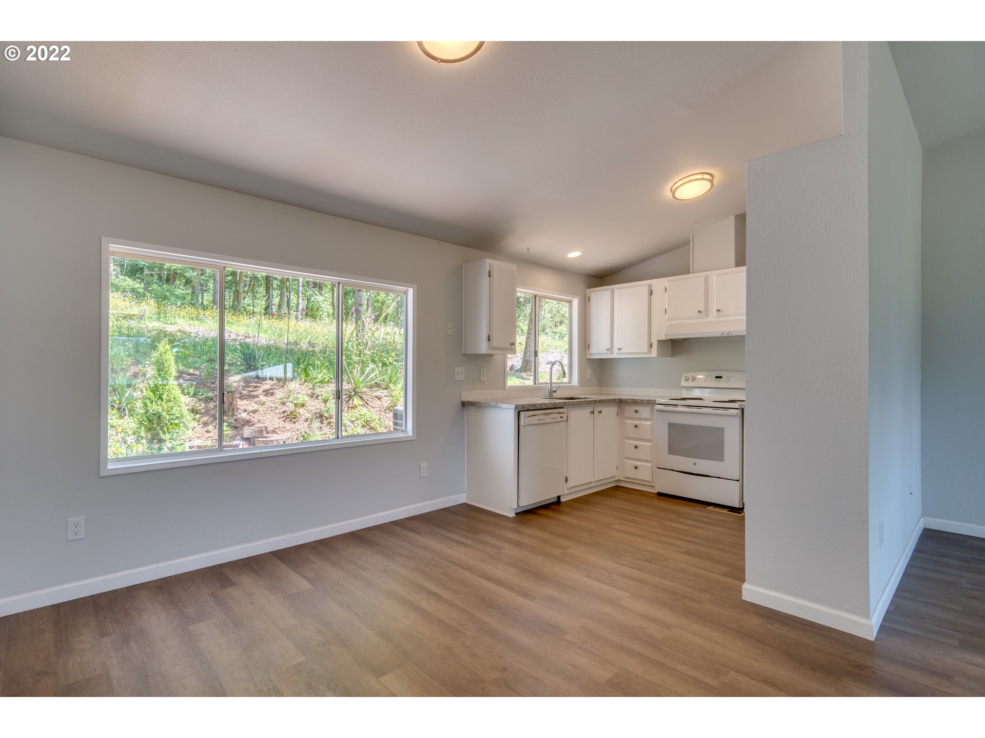 35355 Southeast Surface Road Estacada, OR 97023 - Photo 13 of 32 a view of kitchen with wooden floor and electronic appliances