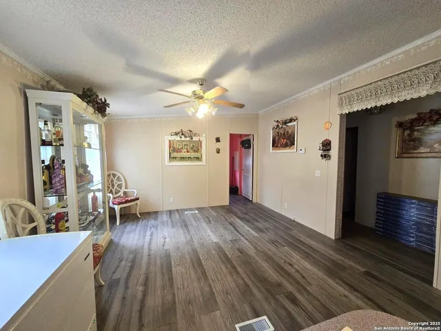 a view of livingroom with furniture and hardwood floor