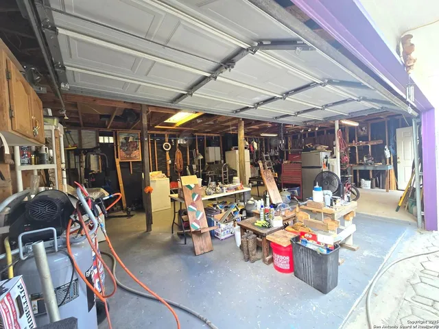 a storage room with lots of gym equipment