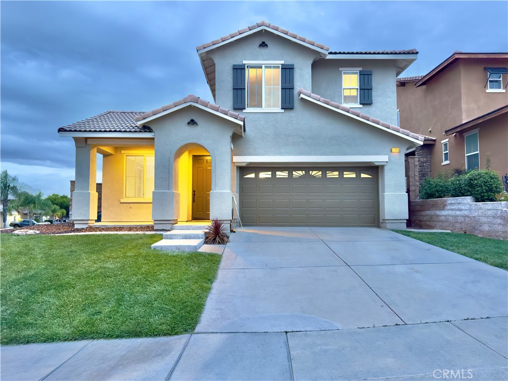 11265 Runyan Road Beaumont, CA 92223 - Photo 15 of 138 a front view of house with yard and green space