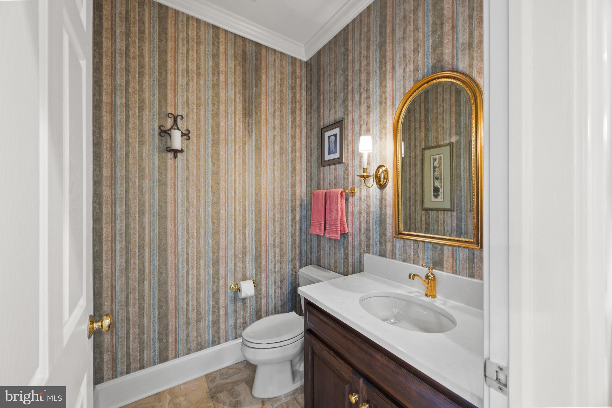 3403 Hidden River View Road Annapolis, MD 21403 - Photo 17 of 50 a bathroom with a sink and a mirror