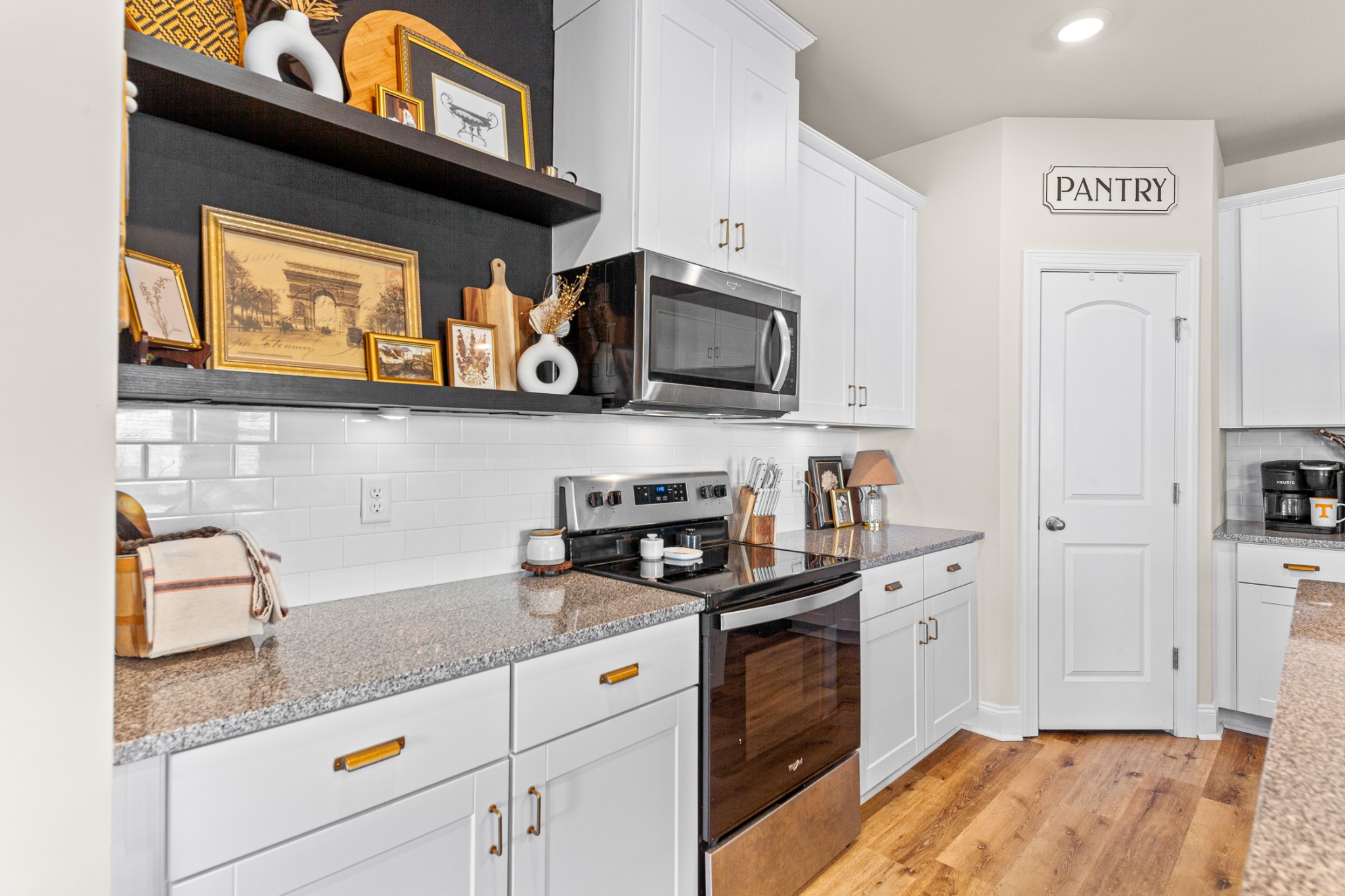 744 Prairie View Drive Columbia, TN 38401 - Photo 25 of 60 a kitchen with stainless steel appliances granite countertop a stove a sink and a microwave
