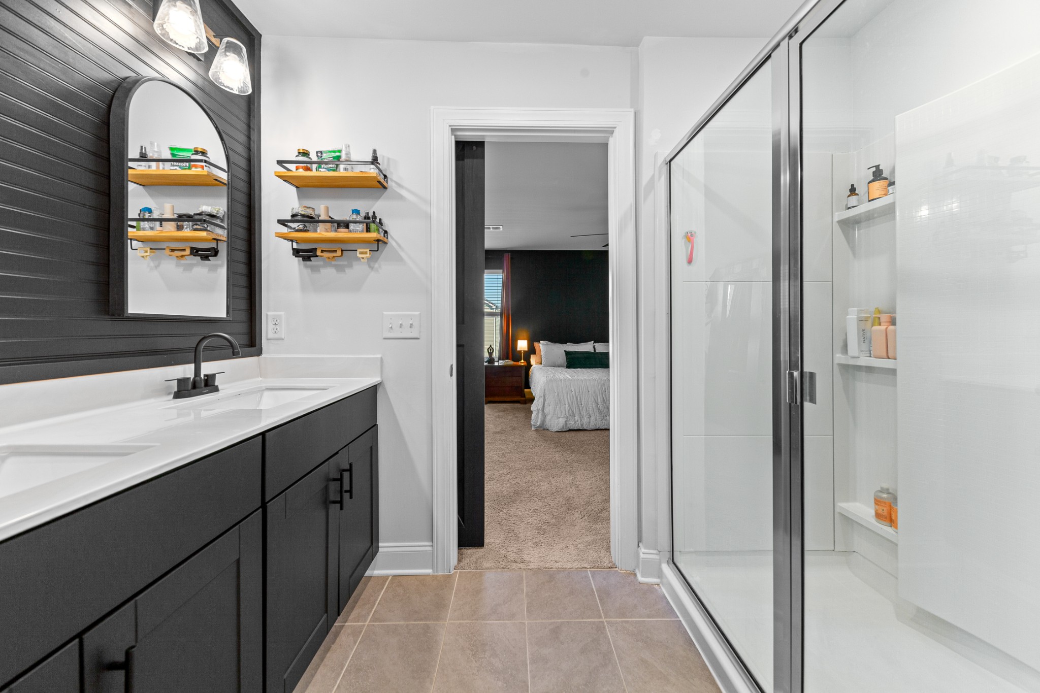 744 Prairie View Drive Columbia, TN 38401 - Photo 37 of 60 a en suite bathroom with a sink a mirror and shower