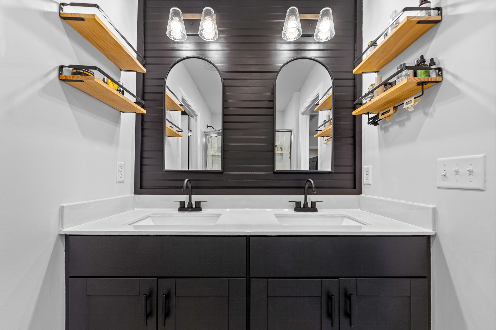 744 Prairie View Drive Columbia, TN 38401 - Photo 38 of 60 a bathroom with a double vanity sink and a mirror