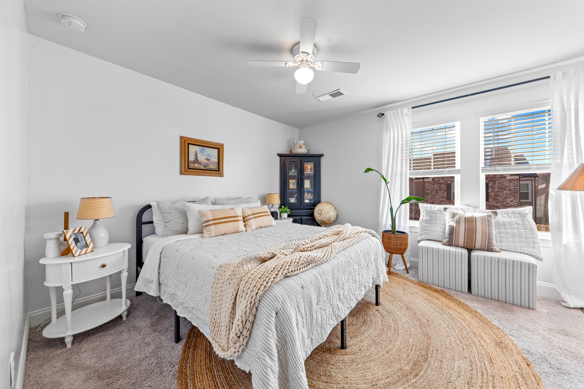 744 Prairie View Drive Columbia, TN 38401 - Photo 39 of 60 a bedroom with a bed a couch and a large window