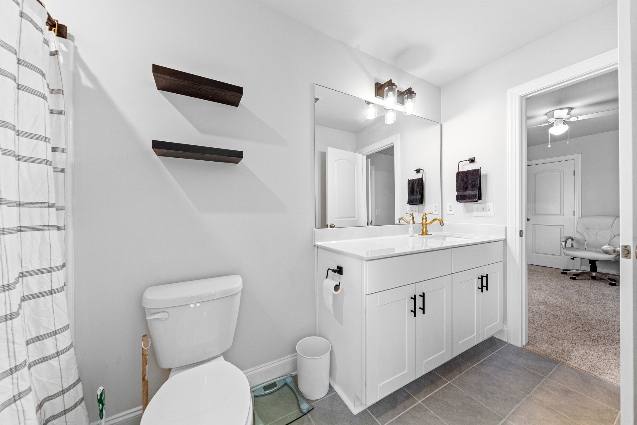 744 Prairie View Drive Columbia, TN 38401 - Photo 43 of 60 a bathroom with a double vanity sink mirror and toilet