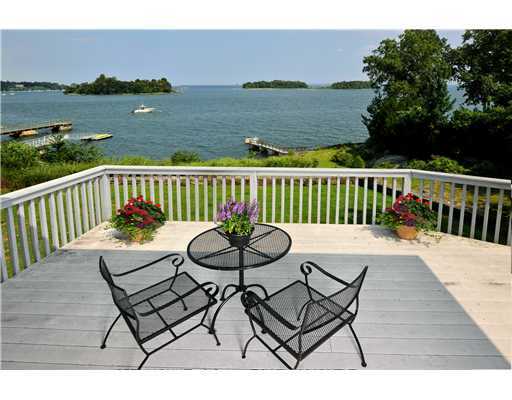 125 Byram Shore Road Greenwich, CT 06830 - Photo 3 of 8 a view of a chairs and table on the roof deck