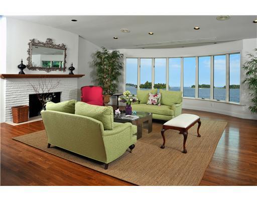 125 Byram Shore Road Greenwich, CT 06830 - Photo 5 of 8 a living room with furniture and a fireplace