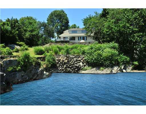 125 Byram Shore Road Greenwich, CT 06830 - Photo 8 of 8 a view of a house with a yard