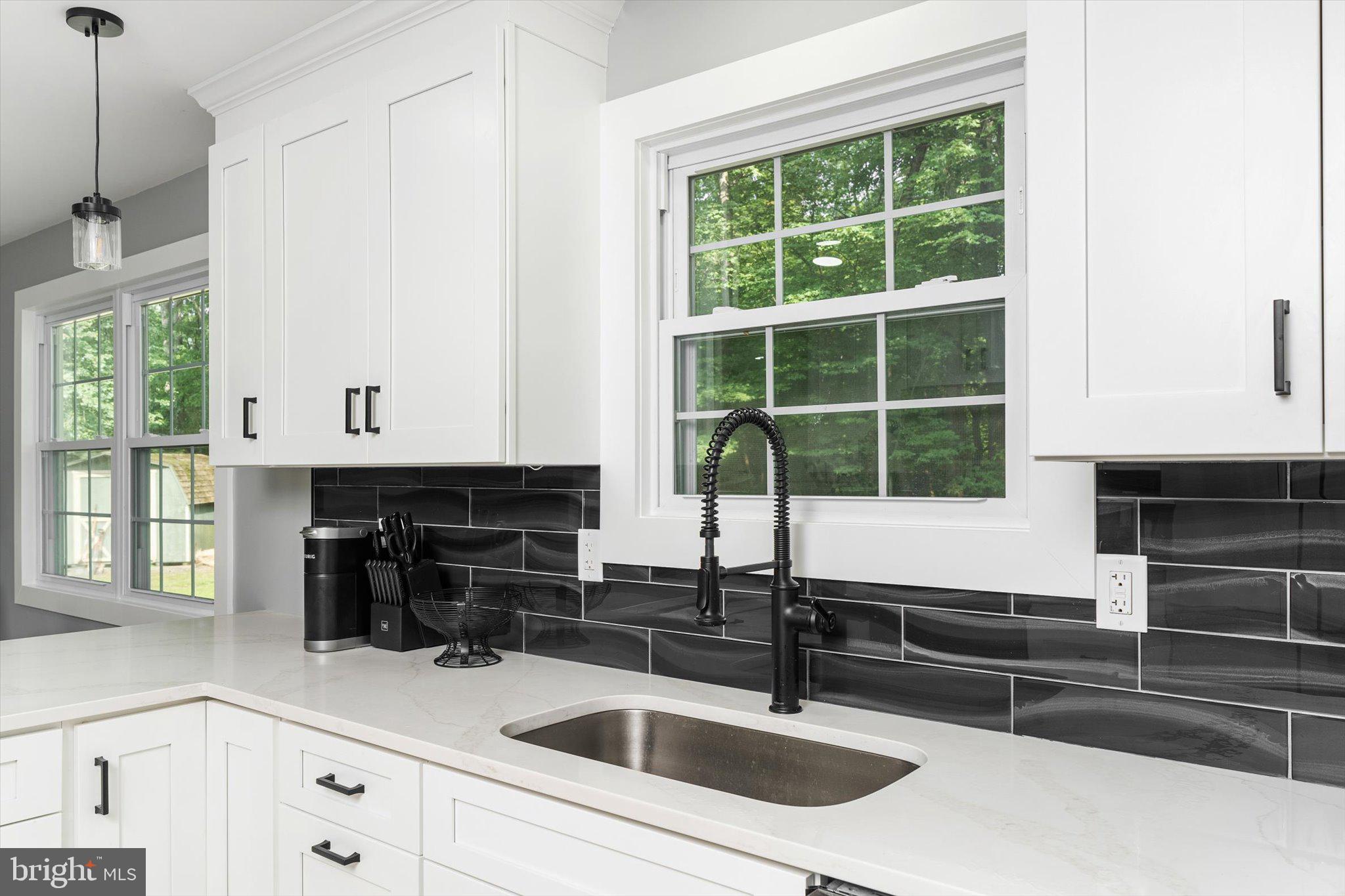 2 Tall Timber Lane Burlington, NJ 08016 - Photo 11 of 30 a kitchen with a sink and large window